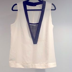 Robbi & Nikki sheer sleeveless top